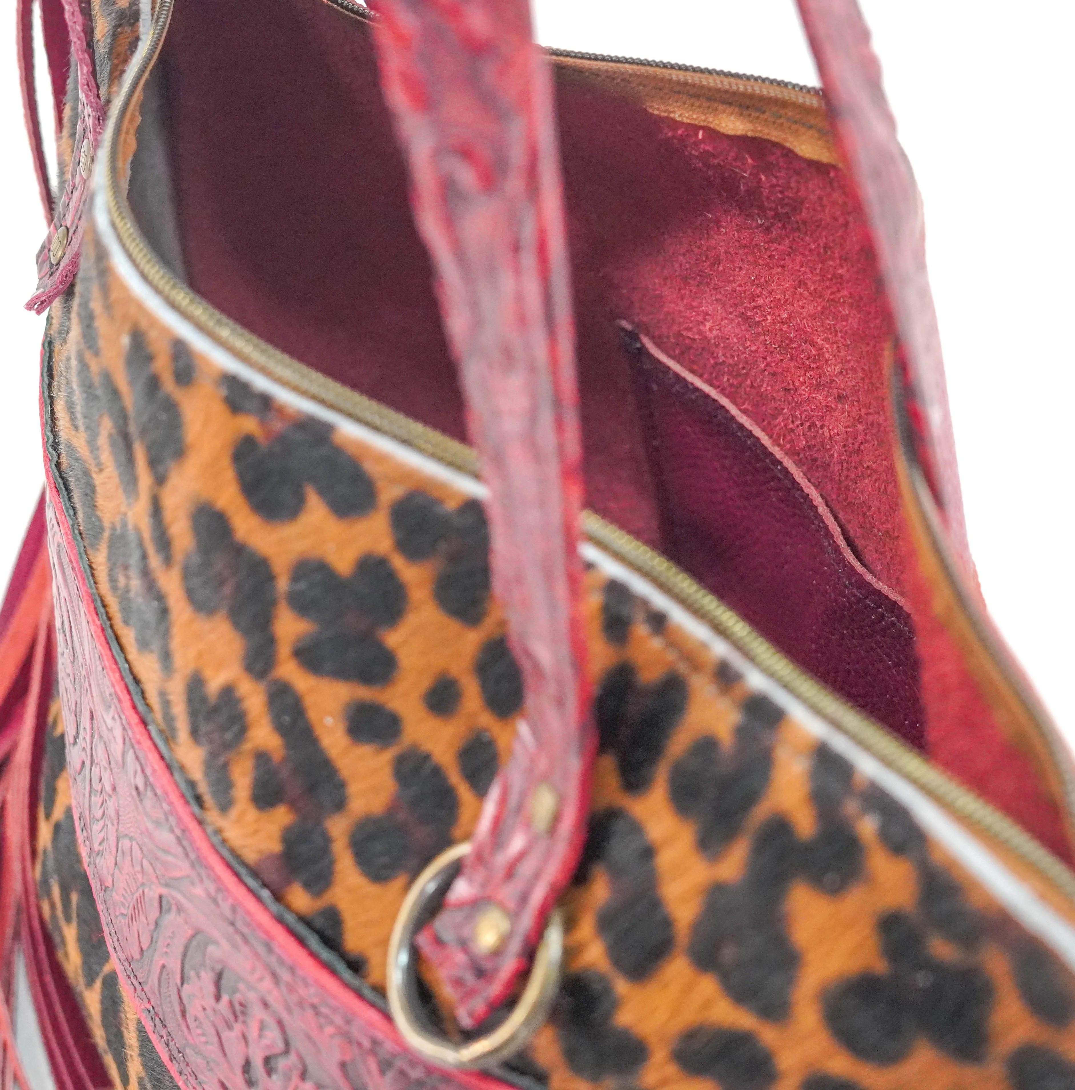 June - Leopard w/ Red Tool