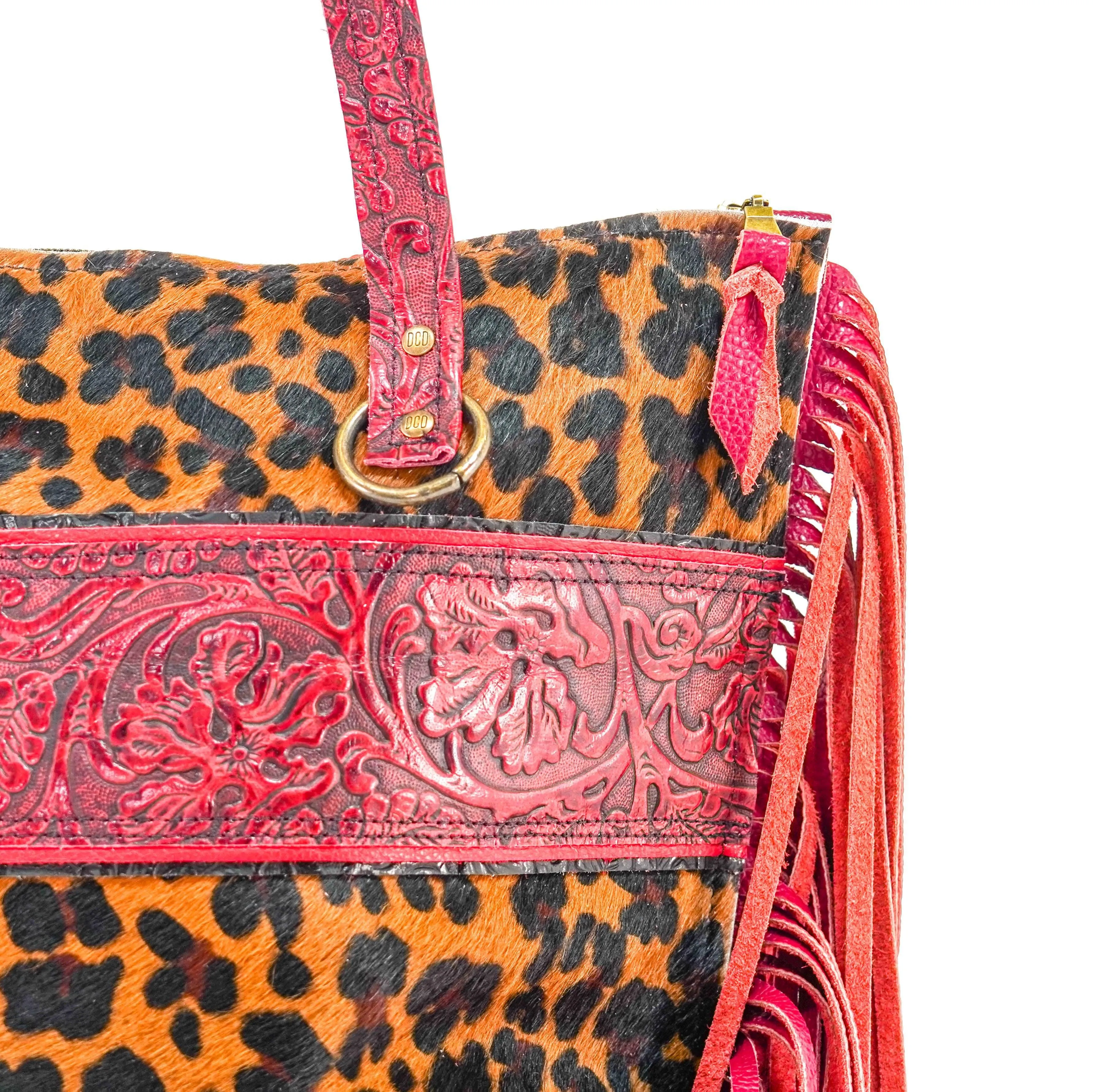 June - Leopard w/ Red Tool