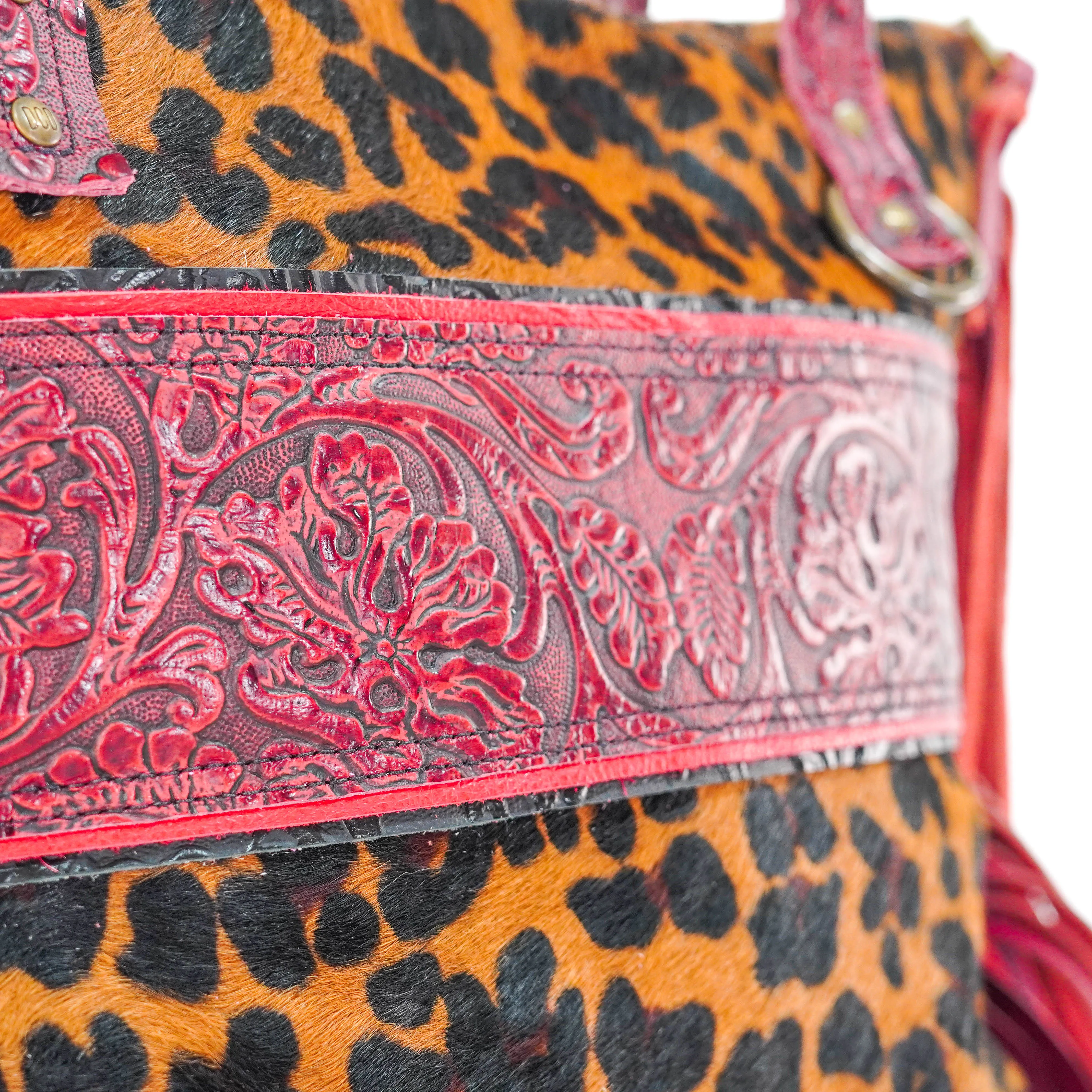 June - Leopard w/ Red Tool