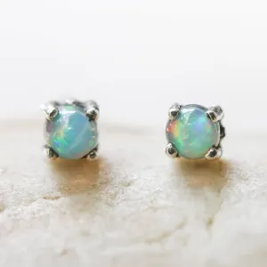 Sterling silver stud earrings with opal cabochon in prongs setting with sterling silver post and backing